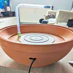 Brunnen mit Pumpe